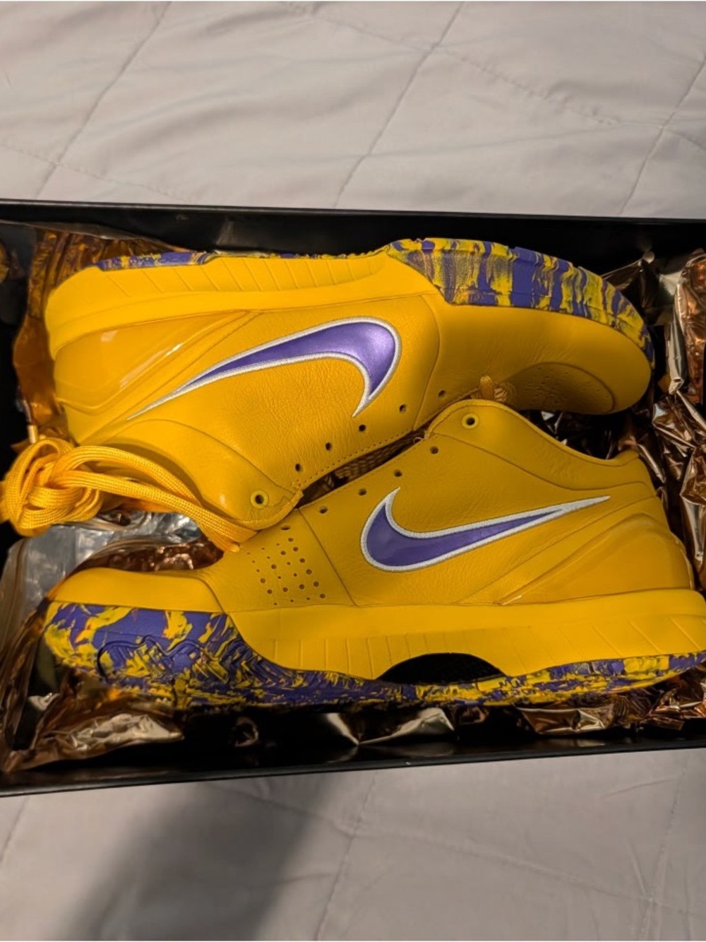 Nike Yellow Low-Top Sneakers with Purple Swoosh and Marbled Outsole